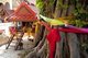 Thailand: Spirit house and a wrapped bo tree, Wat Si Lom, Lampang, Lampang Province