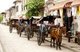 Philippines: Kalesa (horse-drawn carriage) lined up in the Mestizo District, Vigan, Ilocos Sur Province, Luzon Island